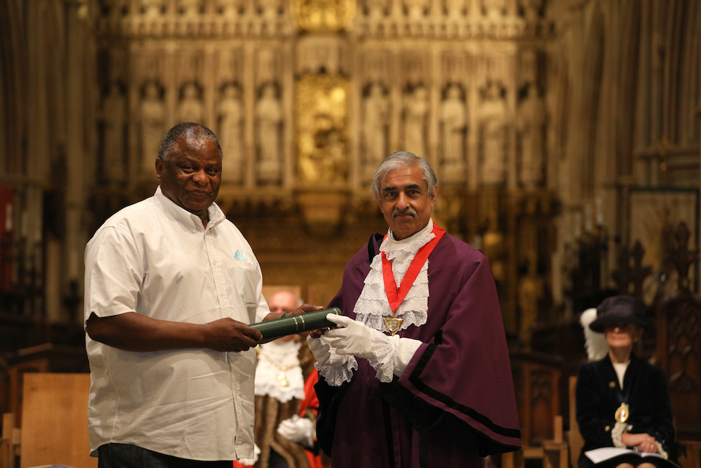 Mr. Kwame Ocloo receives award from Deputy Mayor Councillor Sunil Chopra